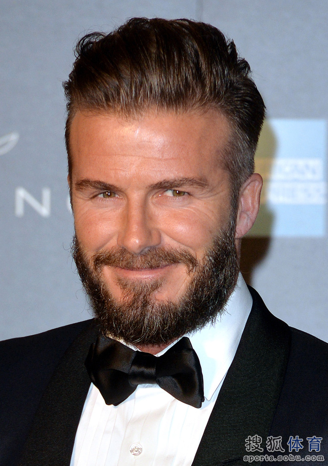 贝帅携爱妻盛装秀恩爱 小贝绅士辣妹显魅惑(图)